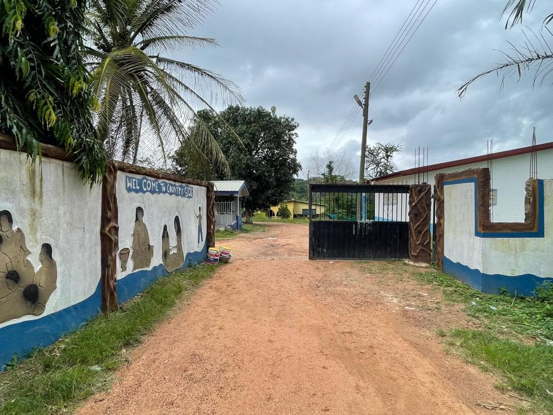 The entrance gate and driveway at Countryside Children's Welfare Home